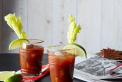 2 bloody mary drinks with garnish