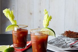 2 bloody mary drinks with garnish