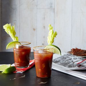 2 bloody mary drinks with garnish